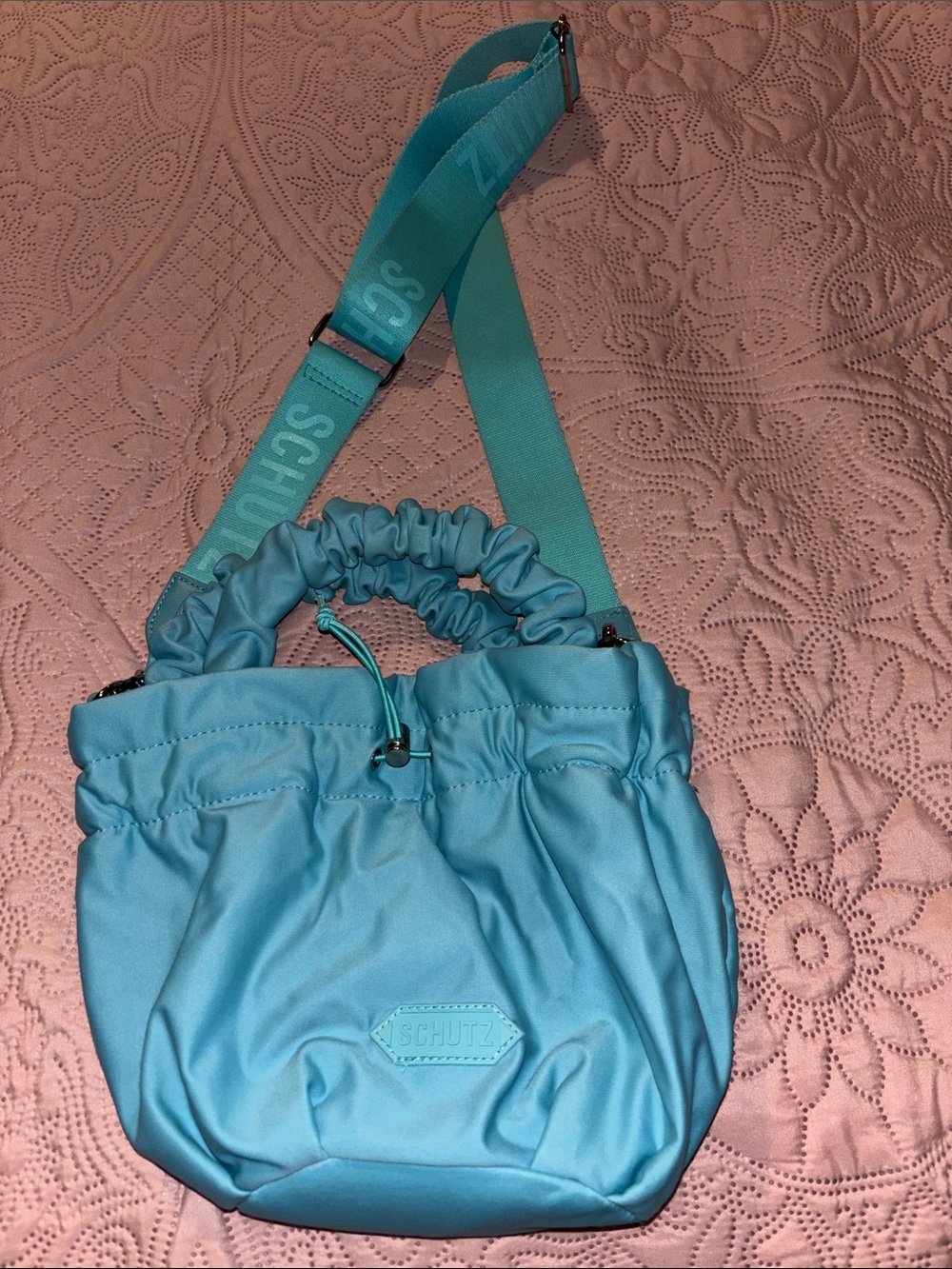 SCHUTZ Turquoise Blue Drawstring Crossbody Bag with Logo Strap
